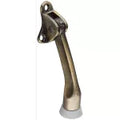 Tope de puerta abatible 4" laton antiguo National Hardware N184-259